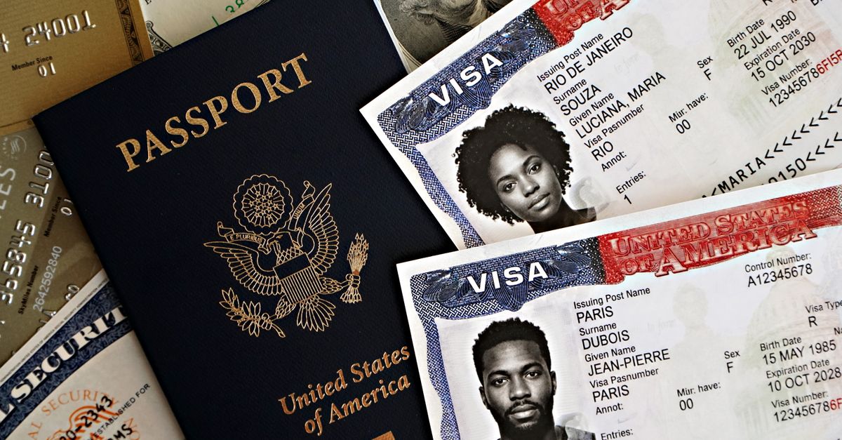 Close-up of a U.S. passport with visas and currency, symbolizing international travel and immigration.